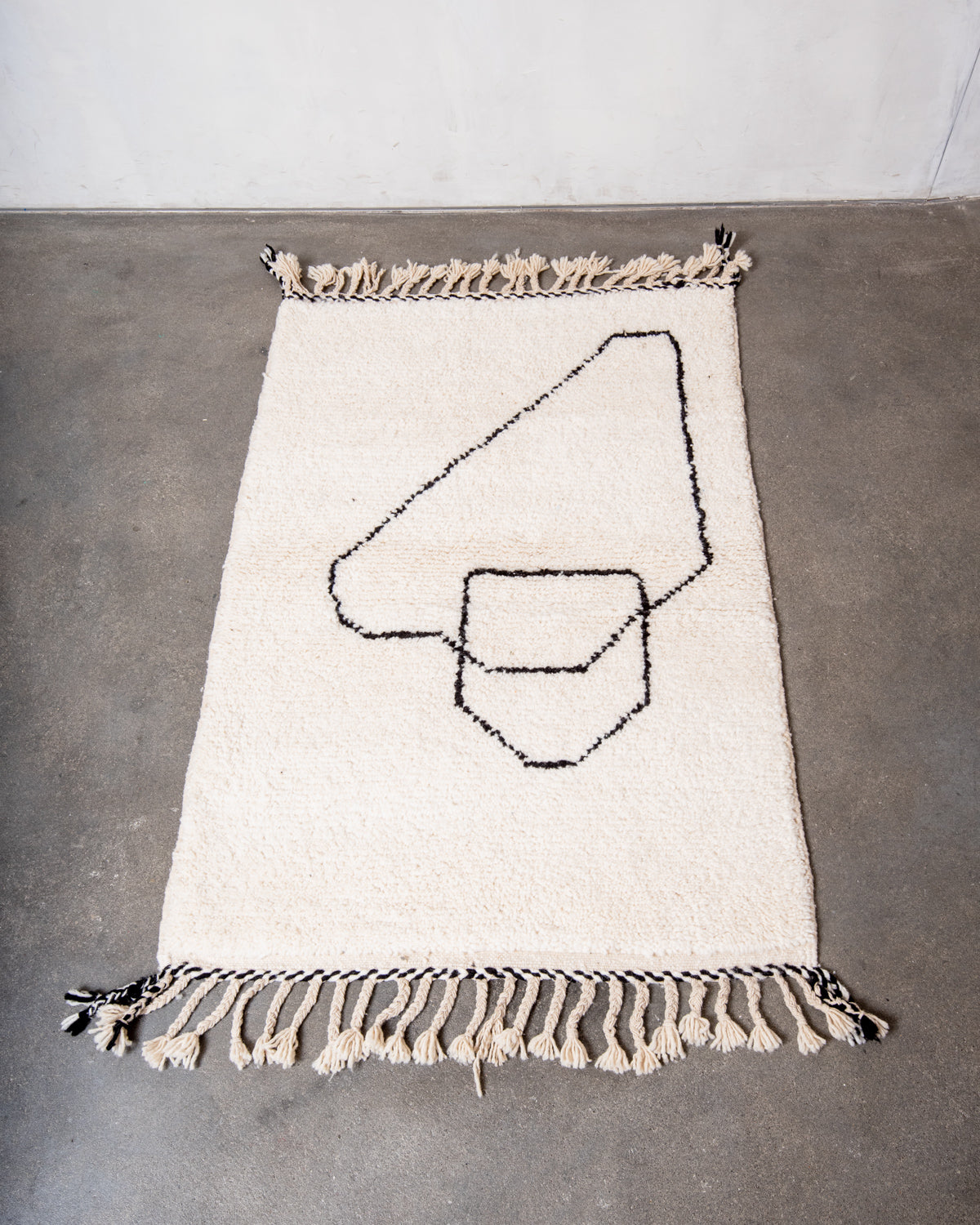 Modern, designer, handcrafted Berber rug from Morocco. Beniourain carpet with minimalist design, natural wool pile and a fluffy texture.
